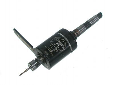 Black tapping head with pointed tip and cylindrical body.