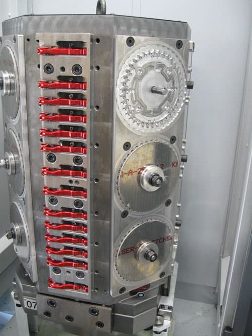 Large metal tombstone with red levers and dials.
