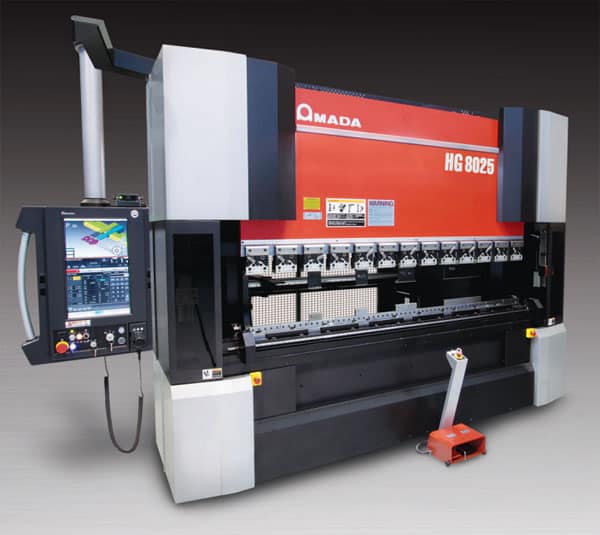 Large industrial press brake machine with red control panel and black machinery, metal forming tools and orange foot pedal.