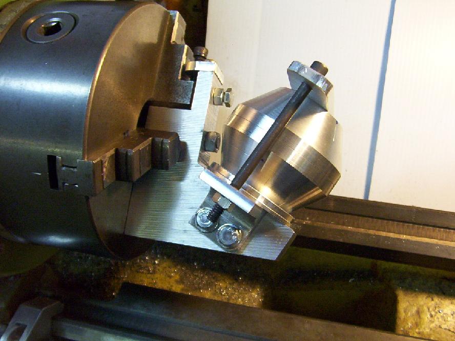 Metal tool with grooved metal surface, possibly used in manufacturing process.