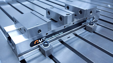 Double vice with parallel jaws holding workpiece.