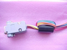 Grey cable with black ferrite bead-wrapped wire bundle and grey connector.
