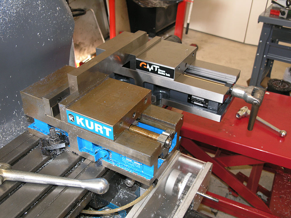 Metalworking tools in a workshop setting.