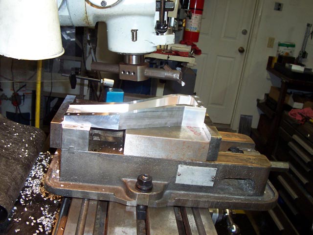 Milling machine with precision cutting capabilities and tooling.