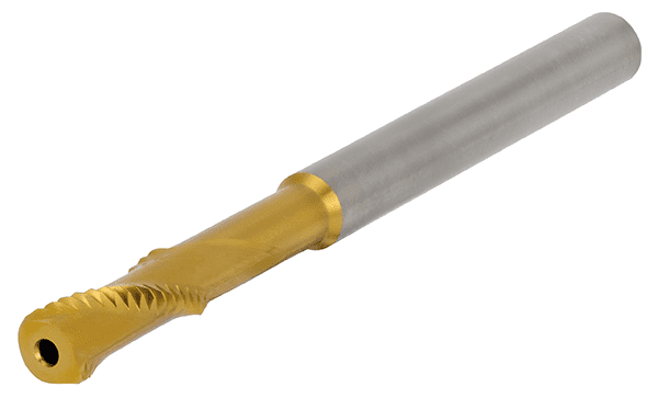 Cylindrical metal object with gold top and small metal hole.