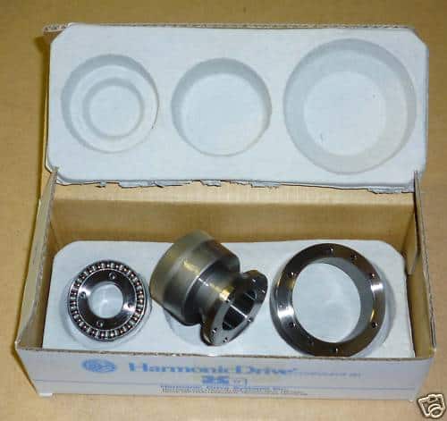 Harmonic drive gear set in cardboard packaging.