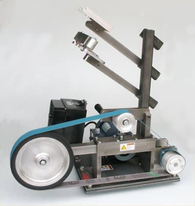 Stainless steel machine with silver cylinder and blue stripe.