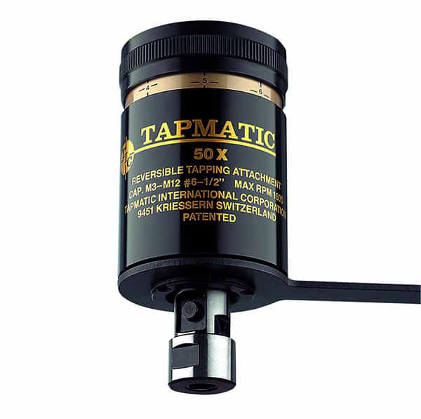 Black cylindrical device with TAPMATIC label on a light gray background.