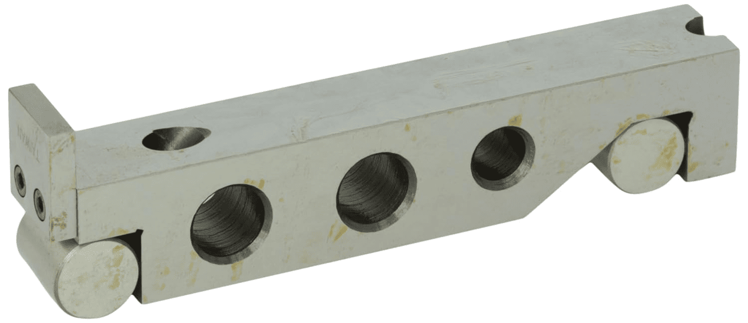 Two rectangular metal parts with circular holes: one with a single hole and one with three holes.